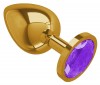 Золотистая большая анальная пробка с фиолетовым кристаллом - 9,5 см. фото 2 — pink-kiss