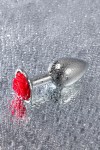 Серебристая анальная втулка с красной розочкой - 8 см. фото 7 — pink-kiss