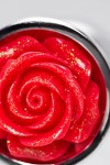 Серебристая анальная втулка с красной розочкой - 8 см. фото 9 — pink-kiss